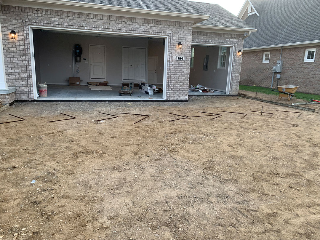 Site preparation for concrete driveway installation